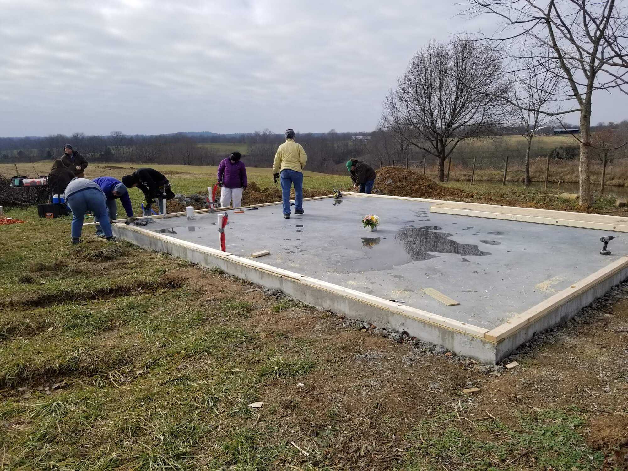 A concrete slab foundation reduces cost.