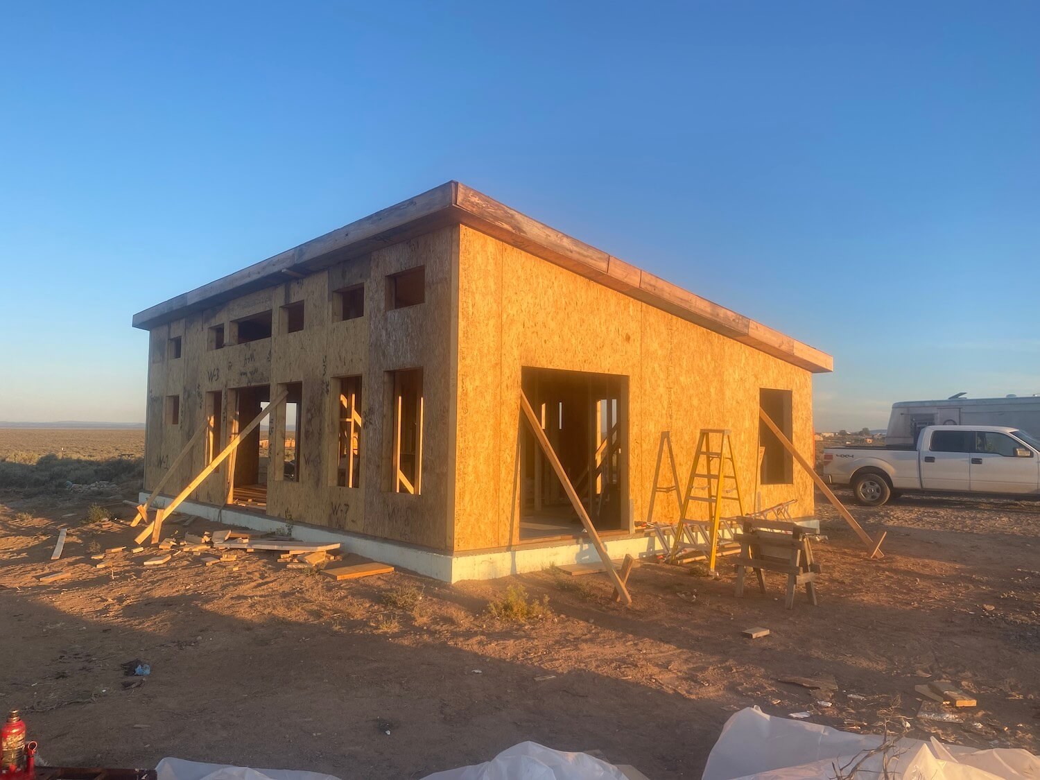 construction of  mighty small homes modern model in the New Mexico high desert town of El Prado